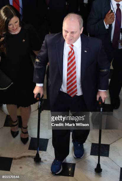 House Republican Whip Steve Scalise uses crutches after returning to the Capitol Hill for the first time after being shot in June at a congressional...