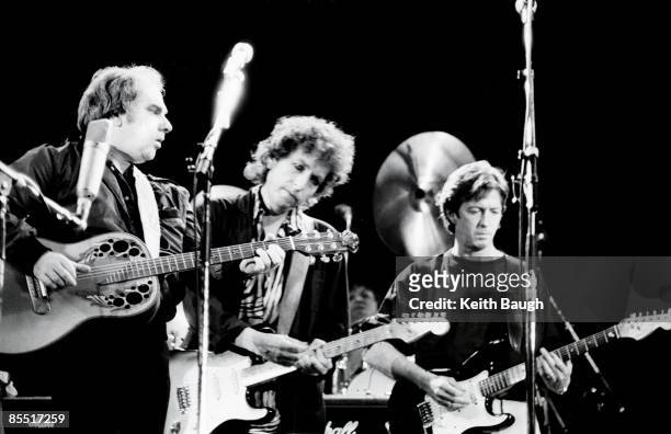 Photo of Bob DYLAN and Eric CLAPTON and Van MORRISON, Van Morrison, Bob Dylan and Eric Clapton performing on stage