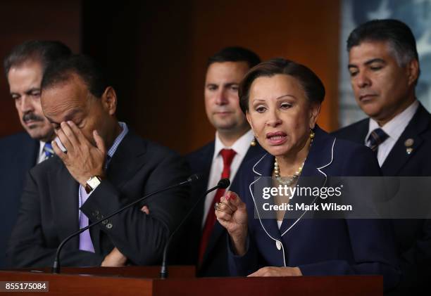 Rep. Nydia M. Velazquez speaks while flanked by House colleagues during a press conference to call for swift legislative action to assist Puerto Rico...