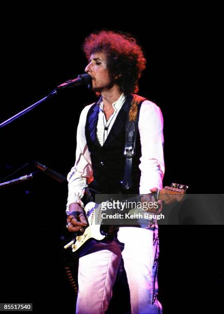 Photo of Bob DYLAN; Bob Dylan performing on stage