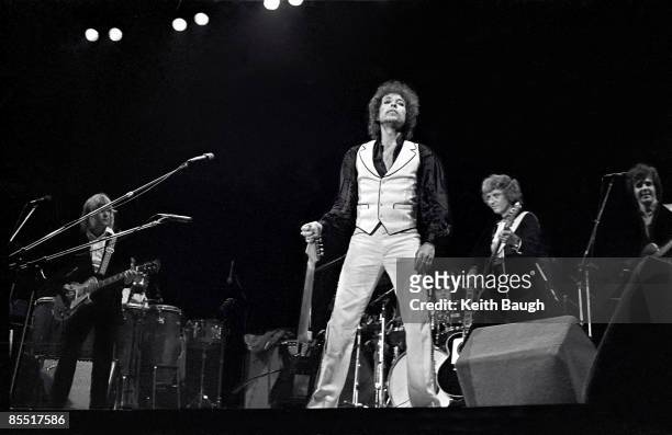 Photo of Bob DYLAN; Bob Dylan performing on stage, full length