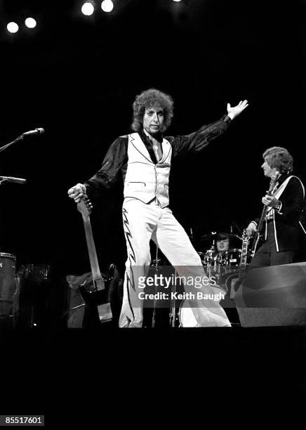 Photo of Bob DYLAN; Bob Dylan performing on stage, full length