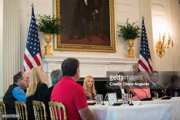 First Lady Melania Trump and Counselor to the President Kellyanne Conway attend a listening session regarding the opioid crisis in the State Dining...