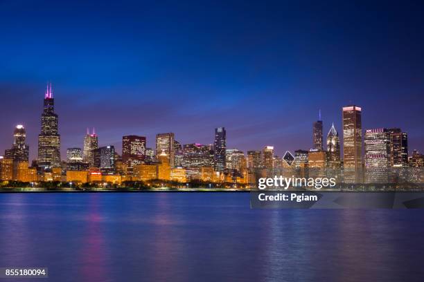 chicago cityscape looking out from the adler planetarium across lake michigan in illinois usa - adler planetarium stock pictures, royalty-free photos & images