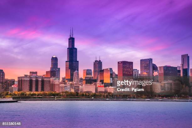 chicago cityscape looking out from the adler planetarium across lake michigan in illinois usa - adler planetarium stock pictures, royalty-free photos & images