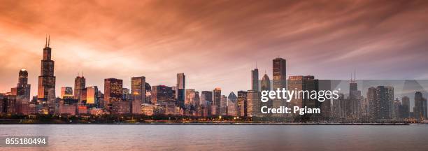 chicago panorama cityscape looking out from the adler planetarium across lake michigan in illinois usa - adler planetarium stock pictures, royalty-free photos & images