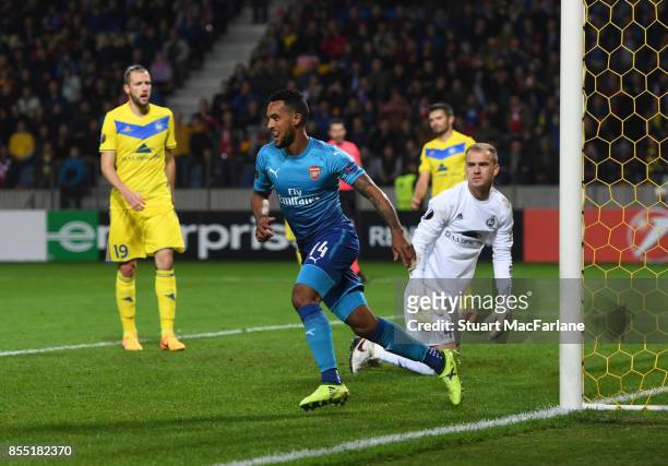 Theo Walcott celebrates scoring for Arsenal during the UEFA Europa League group H match between BATE Borisov and Arsenal FC at Borisov-Arena on...