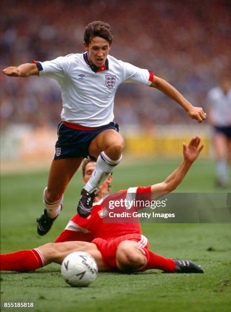 England striker Gary Lineker skips a challenge during the 1990 World Cup Qualifier at Wembley Stadium against Poland on June 3, 1989 in London...