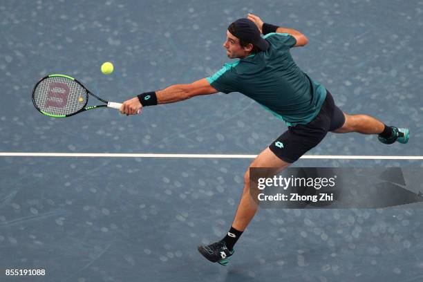 Guido Pella of Argentina returns a shot during the match against Dominic Thiem of Austria during Day 4 of 2017 ATP Chengdu Open at Sichuan...