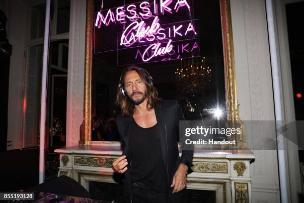 In this handout provided by Messika, Bob Sinclar attends the Messika cocktail as part of the Paris Fashion Week Womenswear Spring/Summer 2018 on...