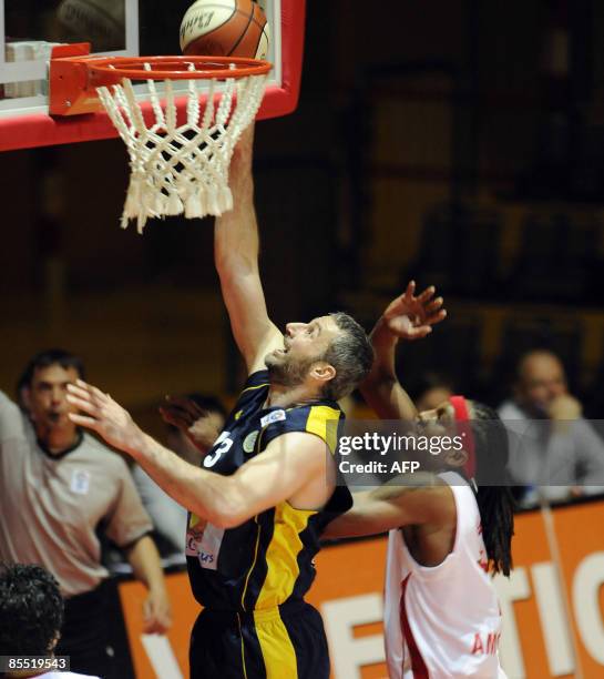 Proteas' Haris Mujezinovic of Cyprus scores while Avis Wyatt from EclipseJet MyGuide tries to block the ball during the quarter finals of the...