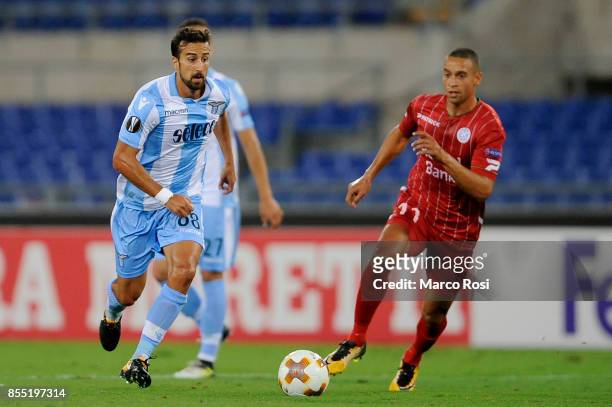 Davide Di Gennaro of SS Lazio compete for the ball with Nill De Pauw of SV Zulte Waregem during the UEFA Europa League group K match between SS Lazio...