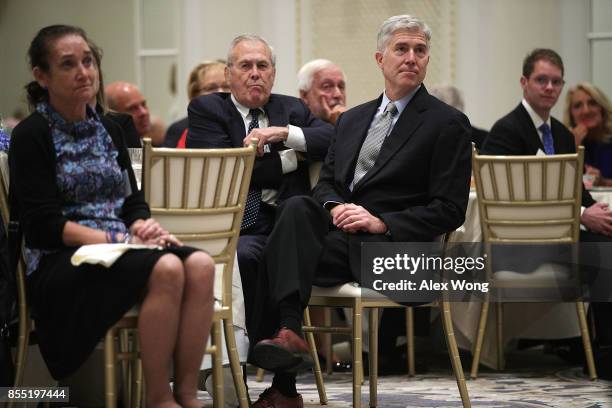 Supreme Court Justice Neal Gorsuch , and former Secretary of Defense Donald Rumsfeld listen during an event hosted by The Fund for American Studies...