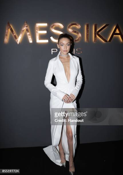In this handout provided by Messika, Gigi Hadid attends the Messika cocktail as part of the Paris Fashion Week Womenswear Spring/Summer 2018 on...