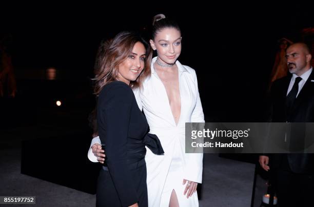In this handout provided by Messika, Valerie Messika and Gigi Hadid attend the Messika cocktail as part of the Paris Fashion Week Womenswear...