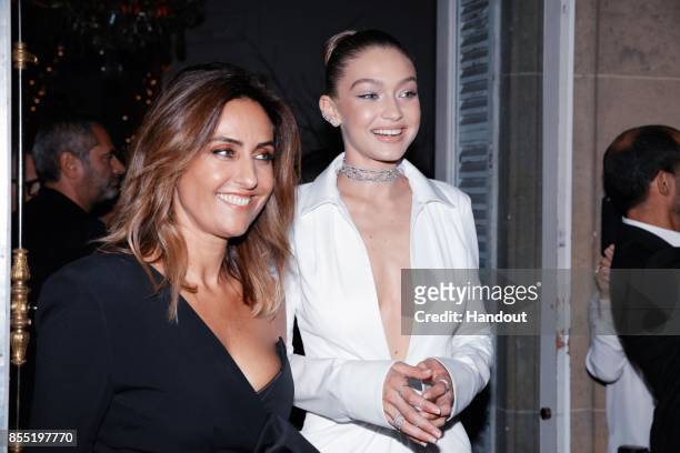 In this handout provided by Messika, Valerie Messika and Gigi Hadid attend the Messika cocktail as part of the Paris Fashion Week Womenswear...