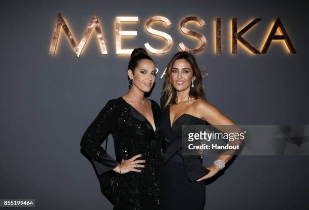 In this handout provided by Messika, Elisa Tovati and Valerie Messika attend the Messika cocktail as part of the Paris Fashion Week Womenswear...