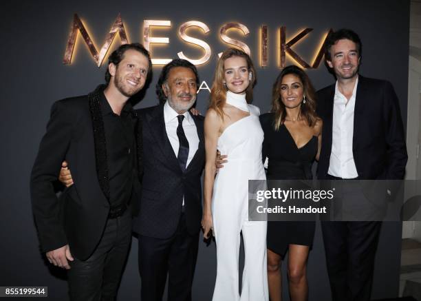 In this handout provided by Messika, from L to R, Jean-Baptiste Sassine, Andre Messika, Natalia Vodianova, Valerie Messika and Antoine Arnault attend...