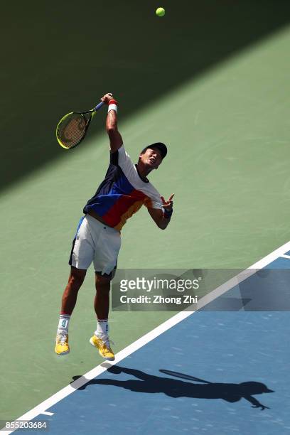 Yen-Hsun Lu of Chinese Taipei serves during the match against Andrey Rublev of Russia during Day 4 of 2017 ATP Chengdu Open at Sichuan International...