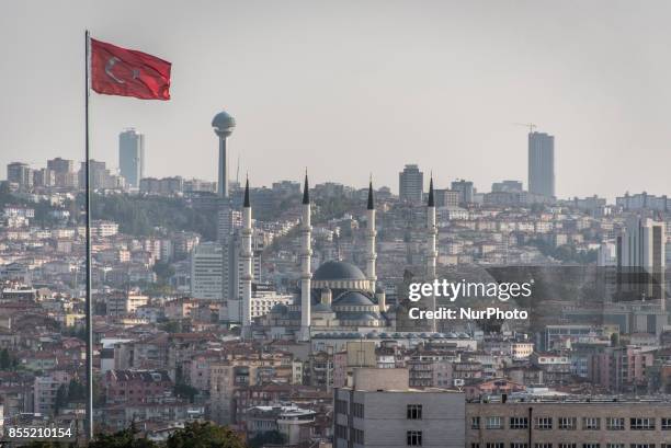 The Turkish flag waves over the Kocatepe Mosque, the largest mosque in Ankara, the capital city of Turkey, on 17 September 2017.