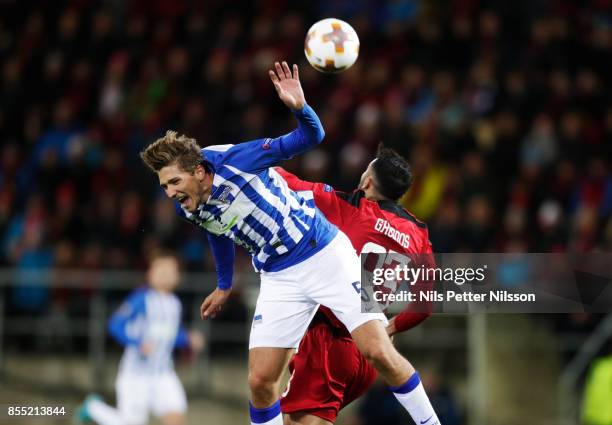 Niklas Stark of Herta Berlin SC and Saman Ghoddos of Ostersunds FK competes for the ball during the UEFA Europa League group J match between...