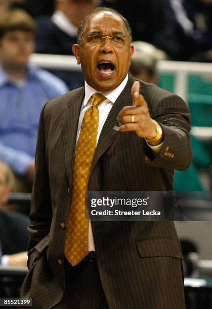 Head coach Tubby Smith of the Minnesota Golden Gophers yells to his team against the Texas Longhorns during the first round of the NCAA Division I...