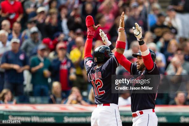 Francisco Lindor celebrates with Jason Kipnis of the Cleveland Indians after both scored on a home run by Kipnis during the sixth inning against the...