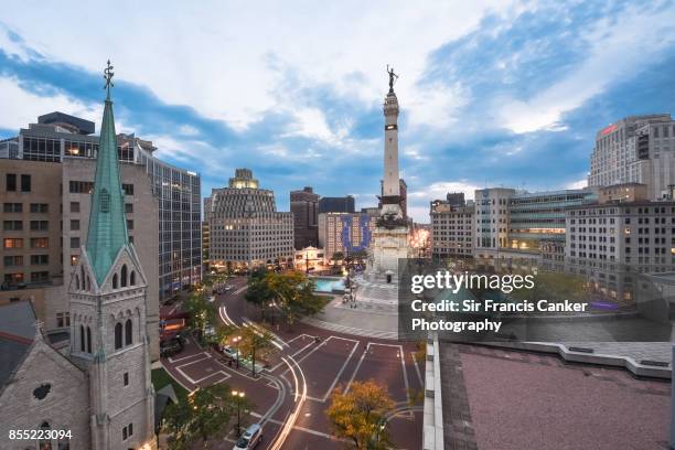 elevated view of indiana state's soldiers and sailors monument on monument circle, indiana, usa - indianapolis aerial stock pictures, royalty-free photos & images