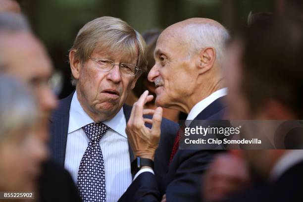 Former United States Solicitor General Ted Olson visits with former Homeland Security Secretary Michael Chertoff before the installation ceremony for...
