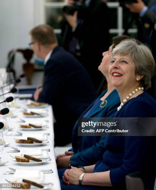 British Prime Minister Theresa May and Polish Prime Minister Beata Szydto attend an informal dinner ahead of an EU Digital Summit in Tallinn, Estonia...