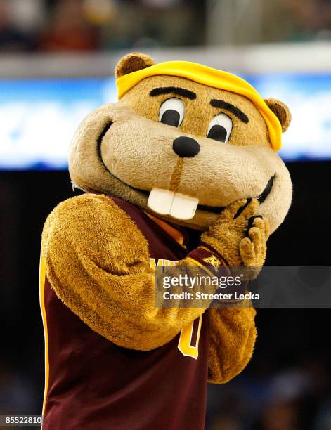 The mascot of the Minnesota Golden Gophers cheers on his team against the Texas Longhorns during the first round of the NCAA Division I Men's...