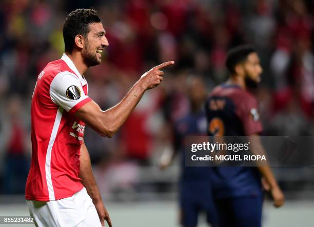 Sporting Braga's Egyptian forward Ahmed Hassan celebrates after scoring the opening goal during the UEFA Europa league football match SC Braga vs...