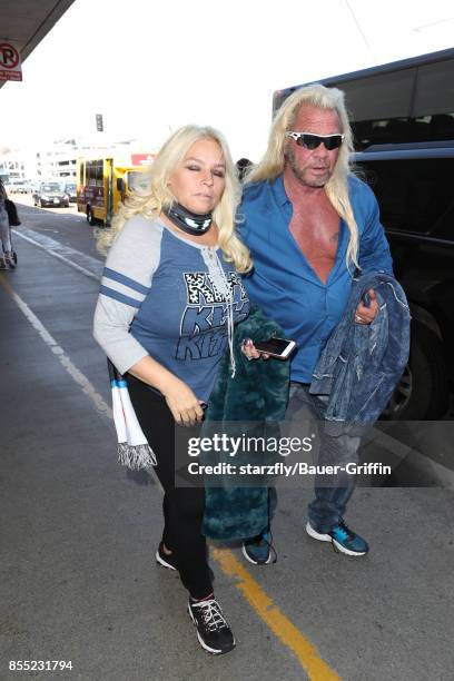 Dog the Bounty Hunter and Beth Chapman are seen at LAX on September 28, 2017 in Los Angeles, California.