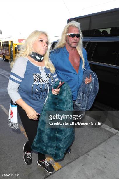 Dog the Bounty Hunter and Beth Chapman are seen at LAX on September 28, 2017 in Los Angeles, California.