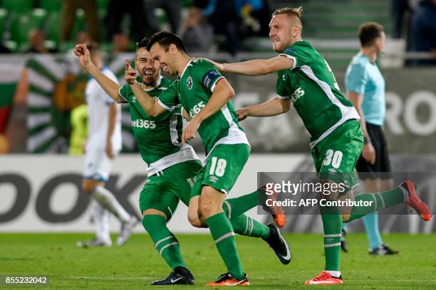 Ludogorets's Bulgarian midfielder Svetoslav Dyakov celebrates with teammates after scoring a goal during the UEFA Europa League Group C football...