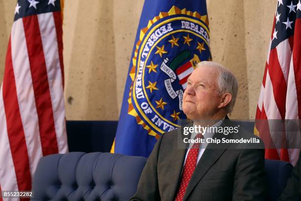 Attorney General Jeff Sessions attends the installation of Federal Bureau of Investigation Director Christopher Wray at FBI headquaters September 28,...