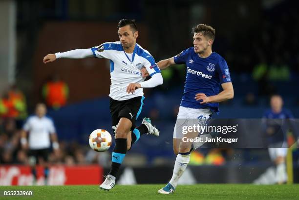 Jonjoe Kenny of Everton and Andre Schembri of Apollon Limassol in action during the UEFA Europa League group E match between Everton FC and Apollon...