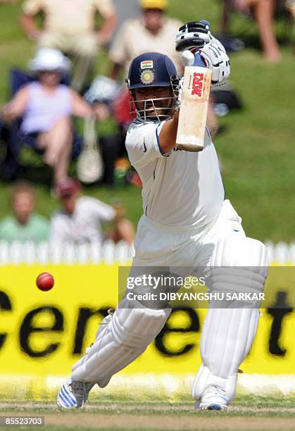 Indian cricketer Sachin Tendulkar plays a shot during the third day of the first Test match between India and New Zealand at the Seddon Park Stadium...