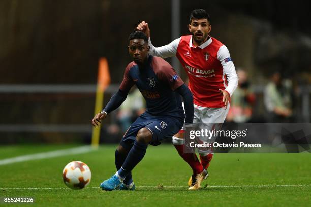 Ricardo Esgaio of Sporting Braga competes for the ball with Eljero Elia of Basaksehir F.K. During the UEFA Europa League group C match between...