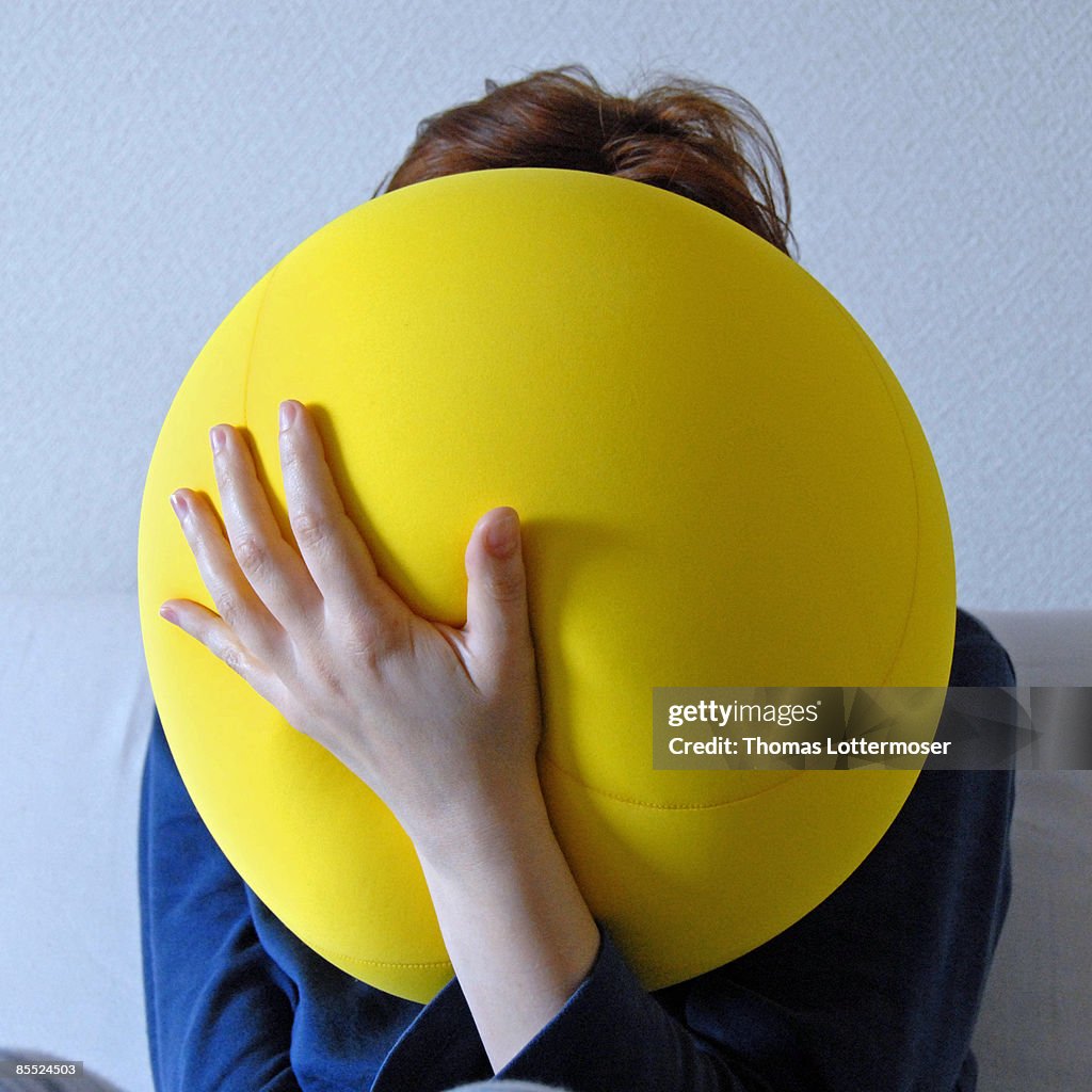 Person with obscured face