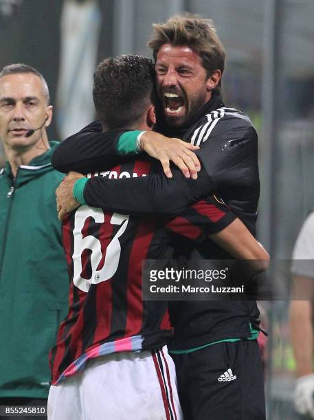 Patrick Cutrone of AC Milan celebrates his goal with his team-mate Marco Storari during the UEFA Europa League group D match between AC Milan and HNK...