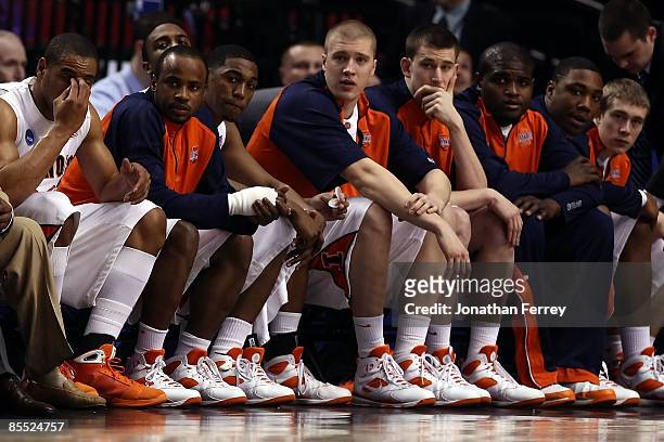 Chester Frazier of the Illinois Fighting Illini and the rest of the Illini bench look on in the first half against the Western Kentucky Hilltoppers...