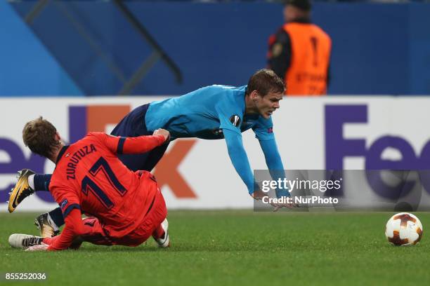 David Zurutuza of FC Real Sociedad and Aleksandr Kokorin of FC Zenit Saint Petersburg vie for the ball during the UEFA Europa League Group L football...