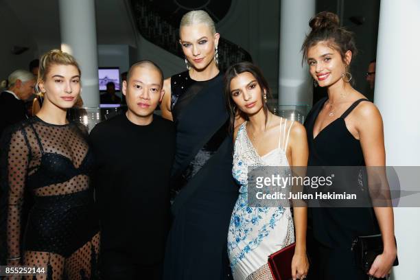 Hailey Baldwin, Jason Wu, Karlie Kloss, Emily Ratajkowski and Taylor Hill attend the Atelier Swarovski By Jason Wu dinner as part of the Paris...