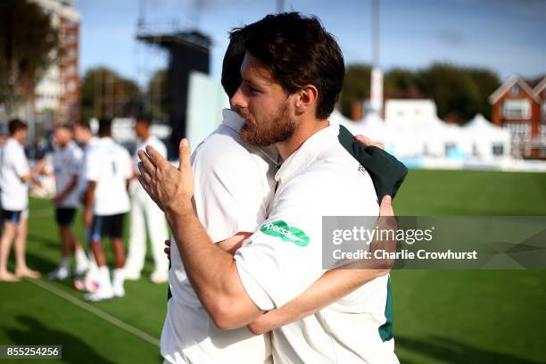 Nottingham's Brett Hutton celebrates the teams promotion with team mates during day four of the Specsavers County Championship Division Two match...