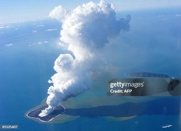 This picture taken on March 19, 2009 shows an aerial photo of ash rising into the air from an undersea volcanic eruption, part of the uninbabited...