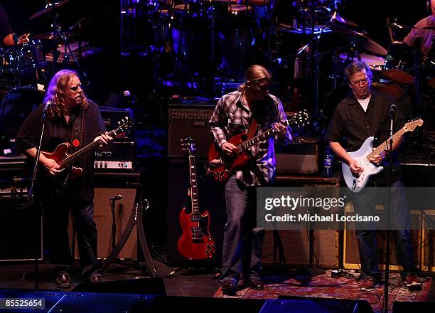 Musicians Warren Haynes and Derek Trucks of The Allman Brothers perform in concert with musician Eric Clapton at the Beacon Theatre on March 19, 2009...