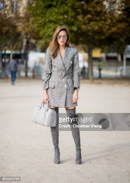 Alexandra Lapp wearing the Essential Boston Bag with Monogramm in grey by MCM, plaid blazer dress with a waist belt from Zara, silver mirrored...