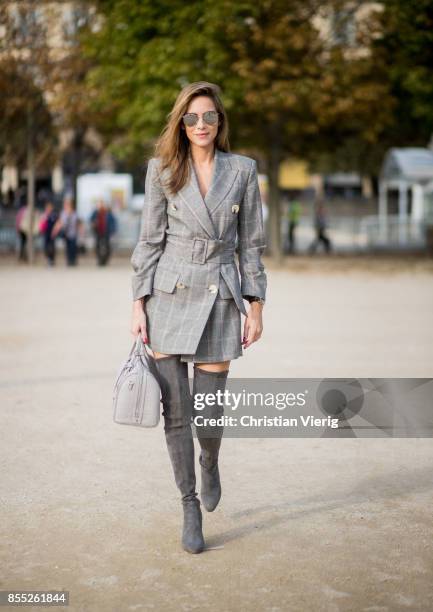 Alexandra Lapp wearing the Essential Boston Bag with Monogramm in grey by MCM, plaid blazer dress with a waist belt from Zara, silver mirrored...