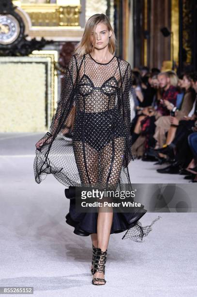 Kate Grigorieva walks the runway during the Balmain show as part of the Paris Fashion Week Womenswear Spring/Summer 2018 on September 28, 2017 in...